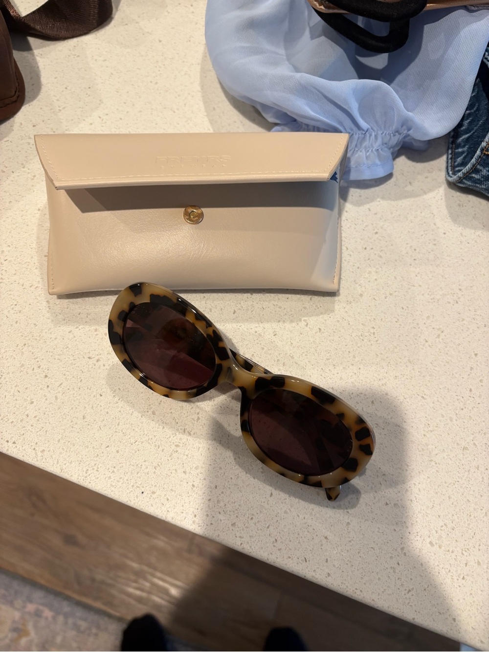 Freyers Women’s Tortoiseshell Oval Sunglasses with Dark Lenses